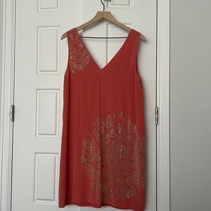 Chic Coral Dress with Gold Detailing